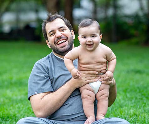 Dr. Atassi with his son Dean in the park