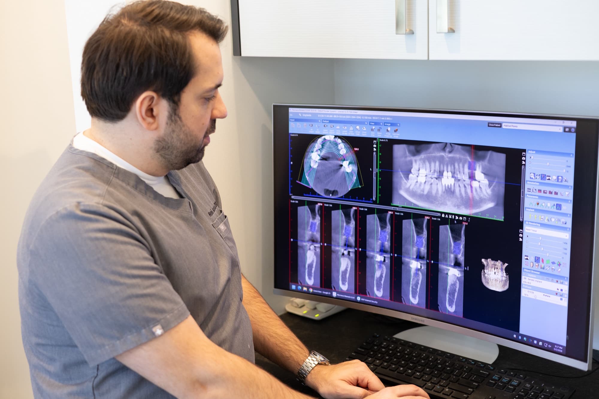 Dr. Atassi at the scan screen