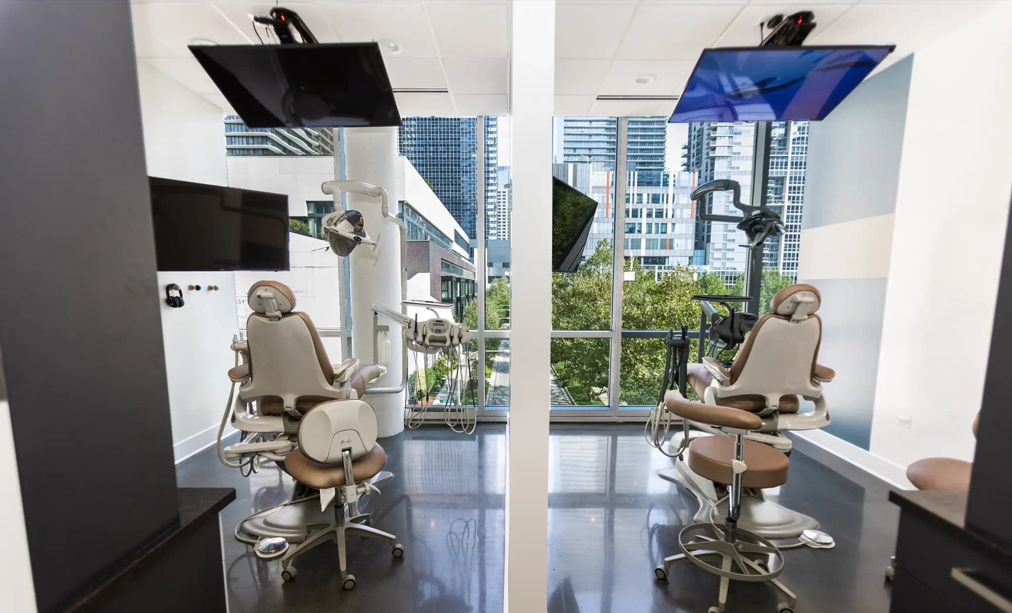 Two treatment rooms side by side, both facing the window